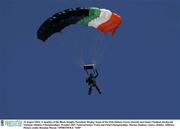10 August 2003; A member of the Black Knights Parachute Display Team of the Irish Defence Forces decends into Santry Stadium during the National Athletics Championships. Woodie's DIY National Senior Track and Field Championships, Morton Stadium, Santry, Dublin. Athletics. Picture credit; Brendan Moran / SPORTSFILE *EDI*