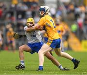 27 May 2018; Caolan MacCraith of Waterford in action against Jack Enright of Clare during the Electric Ireland Munster GAA Hurling Minor Championship Round 2 match between Clare and Waterford at Cusack Park in Ennis, Co Clare. Photo by Ray McManus/Sportsfile