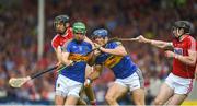 27 May 2018; Noel McGrath, left, and Jason Forde of Tipperary in action against Christopher Joyce, left, and Damien Cahalane of Cork during the Munster GAA Hurling Senior Championship Round 2 match between Tipperary and Cork at Semple Stadium in Thurles, Tipperary. Photo by Daire Brennan/Sportsfile