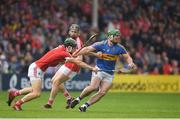 27 May 2018; John O’Dwyer of Tipperary in action against Mark Coleman of Cork during the Munster GAA Hurling Senior Championship Round 2 match between Tipperary and Cork at Semple Stadium in Thurles, Tipperary. Photo by Eóin Noonan/Sportsfile