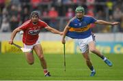 27 May 2018; Christopher Joyce of Cork in action against Noel McGrath of Tipperary during the Munster GAA Hurling Senior Championship Round 2 match between Tipperary and Cork at Semple Stadium in Thurles, Tipperary. Photo by Eóin Noonan/Sportsfile
