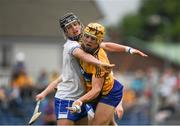 27 May 2018; Mark Rogers of Clare in action against Jack Ó Floinn of Waterford during the Electric Ireland Munster GAA Hurling Minor Championship Round 2 match between Clare and Waterford at Cusack Park in Ennis, Co Clare. Photo by Ray McManus/Sportsfile
