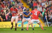 27 May 2018; Dan McCormack of Tipperary in action against Darragh Fitzgibbon, left, and Colm Spillane of Cork during the Munster GAA Hurling Senior Championship Round 2 match between Tipperary and Cork at Semple Stadium in Thurles, Tipperary. Photo by Eóin Noonan/Sportsfile