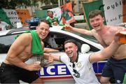 28 May 2018; Republic of Ireland supporters, from left, Jack Tuite, with Darragh Twomey, and Darragh Twomey meet the local police force in Paris prior to the International Friendly match between France and Republic of Ireland at Stade de France in Paris, France. Photo by Stephen McCarthy/Sportsfile