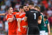 9 June 2018; Mark Lynch of Derry tangles with Kildare goalkeeper Mark Donnellan, before being sent off by referee David Coldrick, during the GAA Football All-Ireland Senior Championship Round 1 match between Derry and Kildare at Derry GAA Centre of Excellence, Owenbeg, Derry. Photo by Piaras Ó Mídheach/Sportsfile