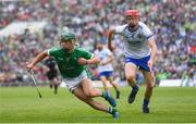 10 June 2018; Sean Finn of Limerick in action against DJ Foran of Waterford during the Munster GAA Hurling Senior Championship Round 4 match between Limerick and Waterford at the Gaelic Grounds in Limerick. Photo by Ramsey Cardy/Sportsfile