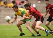 10 June 2018; Leo McLoone of Donegal in action against Anthony Doherty of Down  during the Ulster GAA Football Senior Championship Semi-Final match between Donegal and Down at St Tiernach's Park in Clones, Monaghan. Photo by Oliver McVeigh/Sportsfile
