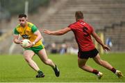 10 June 2018; Patrick McBrearty of Donegal in action against Darren O'Hagan of Down during the Ulster GAA Football Senior Championship Semi-Final match between Donegal and Down at St Tiernach's Park in Clones, Monaghan.  Photo by Oliver McVeigh/Sportsfile