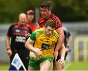 10 June 2018; Eoghan Bán Gallagher of Donegal  in action against Peter Turley of Down during the Ulster GAA Football Senior Championship Semi-Final match between Donegal and Down at St Tiernach's Park in Clones, Monaghan. Photo by Oliver McVeigh/Sportsfile
