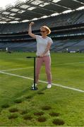 10 June 2018; Volunteers from the GAA Museum and the Croke Park Community team taking up sections of the Croke Park pitch following the Leinster GAA Football Championship Semi-Finals on Sunday 10th June. These unique potted pieces of Croke Park are now on sale for €10 in the GAA Museum gift shop for a limited period. All profits from the sale of these pots will go to the Official GAA Charities for 2018 – Mayo Roscommon Hospice Foundation, Cavan Monaghan Palliative Care, Kerry Hospice Foundation, Jack and Jill Children’s Foundation and Concern. Pictured is Magda Constantinescu. Croke Park, Dublin. Photo by Piaras Ó Mídheach/Sportsfile