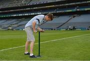 10 June 2018; Volunteers from the GAA Museum and the Croke Park Community team taking up sections of the Croke Park pitch following the Leinster GAA Football Championship Semi-Finals on Sunday 10th June. These unique potted pieces of Croke Park are now on sale for €10 in the GAA Museum gift shop for a limited period. All profits from the sale of these pots will go to the Official GAA Charities for 2018 – Mayo Roscommon Hospice Foundation, Cavan Monaghan Palliative Care, Kerry Hospice Foundation, Jack and Jill Children’s Foundation and Concern. Pictured is Eoin O'Connor, from Swords. Croke Park, Dublin. Photo by Piaras Ó Mídheach/Sportsfile
