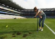 10 June 2018; Volunteers from the GAA Museum and the Croke Park Community team taking up sections of the Croke Park pitch following the Leinster GAA Football Championship Semi-Finals on Sunday 10th June. These unique potted pieces of Croke Park are now on sale for €10 in the GAA Museum gift shop for a limited period. All profits from the sale of these pots will go to the Official GAA Charities for 2018 – Mayo Roscommon Hospice Foundation, Cavan Monaghan Palliative Care, Kerry Hospice Foundation, Jack and Jill Children’s Foundation and Concern. Pictured is Gemma Sexton, from Castleknock. Croke Park, Dublin. Photo by Piaras Ó Mídheach/Sportsfile