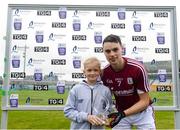 13 June 2018; Róisín Casey, aged 10, from Castlegar, Co. Galway, presents Seán Loftus of Galway with his Bord Gáis Energy Man of the Match award following the meeting of Offaly and Galway in O’Connor Park, Tullamore. Bord Gáis Energy offers its customers unmissable rewards throughout the Championship season, including match tickets and hospitality, access to training camps with Hurling stars and the opportunity to present Man of the Match Awards at U-21 games. Photo by Piaras Ó Mídheach/Sportsfile