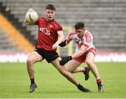 10 June 2018; Ronan Fegan of Down in action against Eoghan Concannon of Derry during the Eirgrid Ulster GAA Football U20 Championship match between Down and Derry at St Tiernach's Park in Clones, Monaghan.  Photo by Oliver McVeigh/Sportsfile