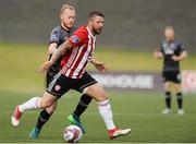 15 June 2018; Rory Patterson of Derry City in action against Chris Sheilds of Dundalk during the SSE Airtricity League Premier Division match between Derry City and Dundalk at the Brandywell Stadium in Derry. Photo by Oliver McVeigh/Sportsfile