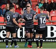 15 June 2018; Robbie Benson of Dundalk, centre, celebrates with team-mates after scoring his side's first goal during the SSE Airtricity League Premier Division match between Derry City and Dundalk at the Brandywell Stadium in Derry. Photo by Oliver McVeigh/Sportsfile