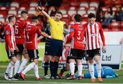 15 June 2018; Referee Paul McLaughlin awards a free as Gerard Doherty of Derry City lies on the ground injured during the SSE Airtricity League Premier Division match between Derry City and Dundalk at the Brandywell Stadium in Derry. Photo by Oliver McVeigh/Sportsfile