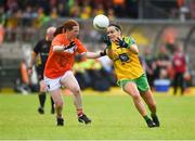 17 June 2018; Geraldine McLaughlin of Donegal in action against Caoimhe Morgan of Armagh during the TG4 Ulster Ladies Football Senior Championship Final match between Armagh and Donegal at Brewster Park in Enniskillen, Co. Fermanagh. Photo by Daire Brennan/Sportsfile