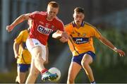 22 June 2018; Damien Gore of Cork in action against Jack Sheedy of Clare during the EirGrid Munster GAA Football U20 Championship semi-final match between Cork and Clare at Páirc Uí Rinn in Cork. Photo by Piaras Ó Mídheach/Sportsfile
