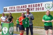 24 June 2018; Saoirse Healey of Galway is presented with the player of the match award by Senior women's manager Colin Bell after the U16 Gaynor Cup Final match between Midlands League and Galway League on Day 2 of the Fota Island Resort Gaynor Tournament at the University of Limerick in Limerick. Photo by Eóin Noonan/Sportsfile