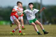 1 July 2018; James Murray of O Donovan Rossa GAC in action against Donagh Murdock of Burren GAC during the John West Féile Peil na nÓg National Competitions 2018 match between Burren GAC and O Donovan Rossa GAC at Stamullen GAA in Meath. This is the third year that the Féile na nGael and Féile Peile na nÓg have been sponsored by John West, one of the world’s leading suppliers of fish. The competition gives up-and-coming GAA superstars the chance to participate and play in their respective Féile tournament, at a level which suits their age, skills and strengths. Photo by Harry Murphy/Sportsfile