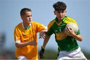 1 July 2018; Jack Conway of Claregalway in action against Conor Quinn of Clonduff GAC during the John West Féile Peil na nÓg National Competitions 2018 match between Claregalway and Clonduff GAC at Stamullen GAA in Meath. This is the third year that the Féile na nGael and Féile Peile na nÓg have been sponsored by John West, one of the world’s leading suppliers of fish. The competition gives up-and-coming GAA superstars the chance to participate and play in their respective Féile tournament, at a level which suits their age, skills and strengths. Photo by Harry Murphy/Sportsfile