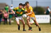 1 July 2018; Eoghan McAlinden of Clonduff GAC in action against Ryan Kearney of Claregalway during the John West Féile Peil na nÓg National Competitions 2018 match between Claregalway and Clonduff GAC at Stamullen GAA in Meath. This is the third year that the Féile na nGael and Féile Peile na nÓg have been sponsored by John West, one of the world’s leading suppliers of fish. The competition gives up-and-coming GAA superstars the chance to participate and play in their respective Féile tournament, at a level which suits their age, skills and strengths. Photo by Harry Murphy/Sportsfile