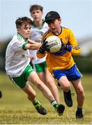 1 July 2018; Tim Fitzpatrick of Ratoath in action against Logan Woods of Burren GAC during the John West Féile Peil na nÓg National Competitions 2018 match between Ratoath and Burren GAC at Stamullen GAA in Meath. This is the third year that the Féile na nGael and Féile Peile na nÓg have been sponsored by John West, one of the world’s leading suppliers of fish. The competition gives up-and-coming GAA superstars the chance to participate and play in their respective Féile tournament, at a level which suits their age, skills and strengths. Photo by Harry Murphy/Sportsfile