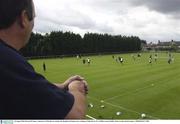 18 August 2003; Dermot O'Connor, chairman of Tolka Rovers watches the Republic of Ireland training session at Tolka Rovers FC in Griffith Avenue, Dublin. Photo by Damien Eagers/Sportsfile