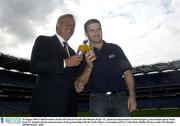 19 August 2003; Chief Executive of the GPA Dessie Farrell, right, with Maurice Pratt, C&C, pictured at the launch of Club Energise, a new isotonic sports drink from C&C Ireland and the announcement of the partnership with the Gaelic Players Association (GPA) at Croke Park in Dublin. Photo by Pat Murphy/Sportsfile