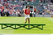 16 August 2003; Cork's Sean Og O'hAilpin makes his way to the bench for the team photograph prior to the Guinness All-Ireland Senior Hurling Championship Semi-Final replay between Cork and Wexford at Croke Park, Dublin. Photo by Ray McManus/Sportsfile