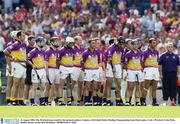 16 August 2003; The Wexford team stand for the national anthem prior to the Guinness All-Ireland Senior Hurling Championship Semi-Final replay between Cork and Wexford at Croke Park, Dublin. Photo by Ray McManus/Sportsfile