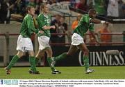 19 August 2003; Clinton Morrison of Republic of Ireland, celebrates with teammates Colin Healy, centre, and Alan Quinn, left, after scoring his sides second goal during an International Friendly between Republic of Ireland and Australia at Lansdowne Road, Dublin. Photo by Damien Eagers/Sportsfile