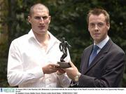 20 August 2003; Colin Hawkins of Bohemians, left, is presented with the the eircom Player of the Month Award for July by Mark Lee, Sponsorship Manager, eircom, at St. Stephen's Green in Dublin. Photo by David Maher/Sportsfile