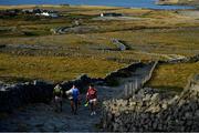 10 July 2018; Michael Fitzsimons of Dublin with the Sam Maguire Cup, along with Shane Enright of Kerry, left, and Damien Comer of Galway, make their way to the GAA Hurling and Football All Ireland Senior Championship Series National Launch at Dun Aengus in the Aran Islands, Co Galway. Photo by Brendan Moran/Sportsfile