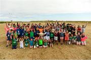 10 July 2018; Members of Aran Islands GAA club along with Johnny Coen of Galway, Michael Fitzsimons of Dublin, and Uachtarán Chumann Lúthchleas Gael John Horan prior to the GAA Hurling and Football All Ireland Senior Championship Series National Launch at the Aran Islands, Co Galway. Photo by Diarmuid Greene/Sportsfile