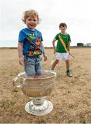 10 July 2018; Eoghan Ó Moran, aged 2, and Cillian O'Moran, aged 8, with the Sam Maguire cup during a visit to Aran Islands GAA club prior to the GAA Hurling and Football All Ireland Senior Championship Series National Launch at the Aran Islands, Co Galway.   Photo by Diarmuid Greene/Sportsfile