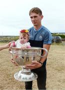 10 July 2018; Michael Fitzsimons of Dublin with Lisa Conneely, aged 10 months, during a visit to Aran Islands GAA club prior to the GAA Hurling and Football All Ireland Senior Championship Series National Launch at the Aran Islands, Co Galway. Photo by Diarmuid Greene/Sportsfile