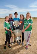 10 July 2018; Jessica Boland, Grace Rodgers, Shane Dirrane, Lauren Rodgers, and Cleonna Dillane, from Inis Mór, Co. Galway, with the Sam Maguire and Liam Mac Carthy cups during a visit to Aran Islands GAA club prior to the GAA Hurling and Football All Ireland Senior Championship Series National Launch at the Aran Islands, Co Galway. Photo by Diarmuid Greene/Sportsfile