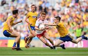 14 July 2018; Peter Harte of Tyrone is tackled by Cathal Compton of Roscommon during the GAA Football All-Ireland Senior Championship Quarter-Final Group 2 Phase 1 match between Tyrone and Roscommon at Croke Park, in Dublin. Photo by David Fitzgerald/Sportsfile
