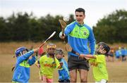 19 July 2018; Dublin hurler Danny Sutcliffe surprised youngsters taking part in one of the county’s most popular Kellogg’s GAA Cúl Camps with a visit to Éire Óg in Wicklow recently. In attendance with Danny Sutcliffe are participants, from left, Ruth Howard, age 6, Katie Brady, age 6, David Thomas, age 6, and Brian Kelly, age 6. Danny joined in what was an action-packed morning of activity and fun, teaching the children GAA skills, sharing great insider tips and promoting the importance of active play. More than 142,000 children took part in Kellogg’s GAA Cúl Camps last year.  The camps are for children aged 6 – 13 years who can enjoy a week of on-the-pitch action learning new skills, making new friends, being active and having fun during the school holidays in July and August. Kellogg’s involvement with Cúl Camps stems from its commitment to promoting and encouraging physical activity.  Educating children on the importance of nutrition to support active play is a key component of Cúl Camps and Kellogg’s believes in the power of breakfast to fuel activity both on and off the pitch. The camps are in full swing and surprise visits will take place across all provinces during the summer. For more information parents can log on to www.kelloggsculcamps.gaa.ie Photo by Stephen McCarthy/Sportsfile