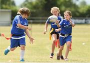 18 July 2018; Hayden Coyle passes the ball to team-mate Erin Fitzpatrick during the Bank of Ireland Leinster Rugby Summer Camp at Portlaoise RFC in Togher, Portlaoise, Co. Laois. Photo by Matt Browne/Sportsfile