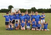 18 July 2018; Leinster player's Bryan Byrne and Peter Dooley with children from the summer camp during the Bank of Ireland Leinster Rugby Summer Camp at Portlaoise RFC in Togher, Portlaoise, Co. Laois. Photo by Matt Browne/Sportsfile
