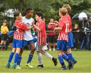 29 July 2018; Sean Okeke of Knocknacarra is congratulated by team-mates after saving a penalty during a penalty shoot-out against Tullamore Town, during Ireland's premier underaged soccer tournament, the Volkswagen Junior Masters. The competition sees U13 teams from around Ireland compete for the title and a €2,500 prize for their club, over the days of July 28th and 29th, at AUL Complex in Dublin. Photo by Seb Daly/Sportsfile