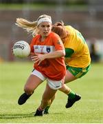 4 August 2018; Lauren McConville of Armagh in action against Deirdre Foley of Donegal during the TG4 All-Ireland Ladies Football Senior Championship quarter-final match between Armagh and Donegal at Healy Park in Omagh, Tyrone. Photo by Oliver McVeigh/Sportsfile