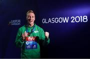 4 August 2018; Shane Ryan of Ireland celebrates with his bronze medal after finishing third in the Mens 50m Backstroke Final during day three of the 2018 European Championships at Tollcross International Swimming Centre in Glasgow, Scotland. Photo by David Fitzgerald/Sportsfile