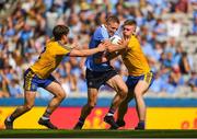 5 August 2018; Eoghan O'Gara of Dublin in action against David Murray, left, and Darra Pettit of Roscommon during the GAA Football All-Ireland Senior Championship Quarter-Final Group 2 Phase 3 match between Dublin and Roscommon at Croke Park in Dublin. Photo by Daire Brennan/Sportsfile