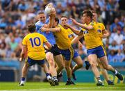 5 August 2018; Eoghan O'Gara of Dublin in action against Roscommon players, from left, Niall Kilroy, David Murray, and Niall McInerney during the GAA Football All-Ireland Senior Championship Quarter-Final Group 2 Phase 3 match between Dublin and Roscommon at Croke Park in Dublin. Photo by Piaras Ó Mídheach/Sportsfile