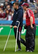 11 August 2018; Injured Galway player Paul Conroy with team doctor, Dr Enda Devitt, before the GAA Football All-Ireland Senior Championship semi-final match between Dublin and Galway at Croke Park in Dublin.  Photo by Piaras Ó Mídheach/Sportsfile