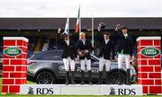 11 August 2018; Riders, from left, Richard Howley of Ireland, Padraic Judge of Ireland, Michael Pender of Ireland and Pedro Junqueira Muylaert of Brazi after winning the Land Rover Puissance during the StenaLine Dublin Horse Show at the RDS Arena in Dublin. Photo by Harry Murphy/Sportsfile
